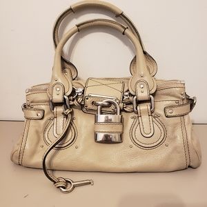 CHLOE BAG KEY/LOCK 100.00 OR OFFER